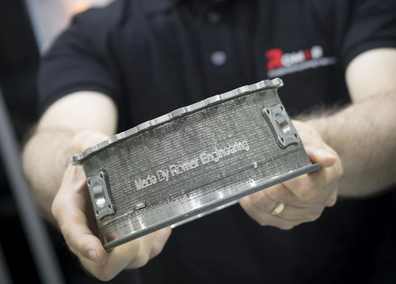Hand of a man holding a metal product